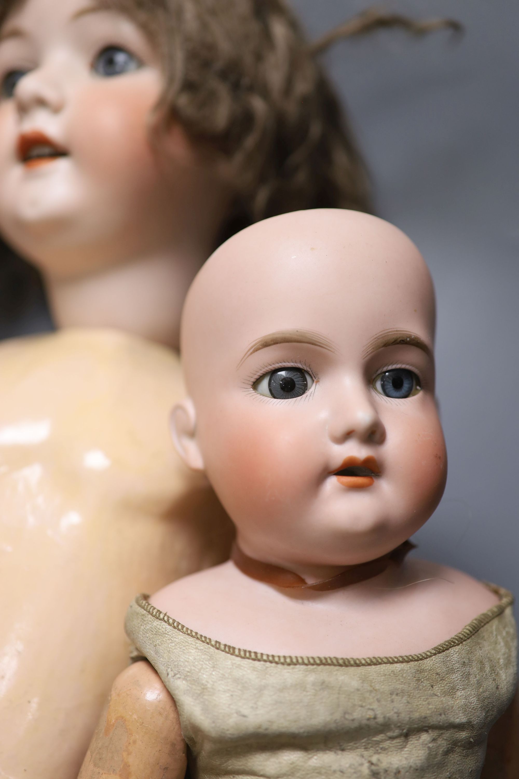 Two Armand Marseille bisque head dolls, 370 AM 4 DEP and 370 AM 2/0 DEP, with jointed kid bodies and a Koppelsdorf bisque head doll, ta